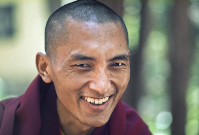 Close-up portrait of Lama Zopa Rinpoche at Lake Arrowhead, California, 1975.