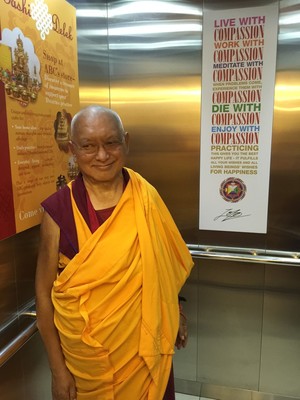Rinpoche in the elevator at Amitabha Buddhist Centre, Singapore, March 2016. Photo: Roger Kunsang.
