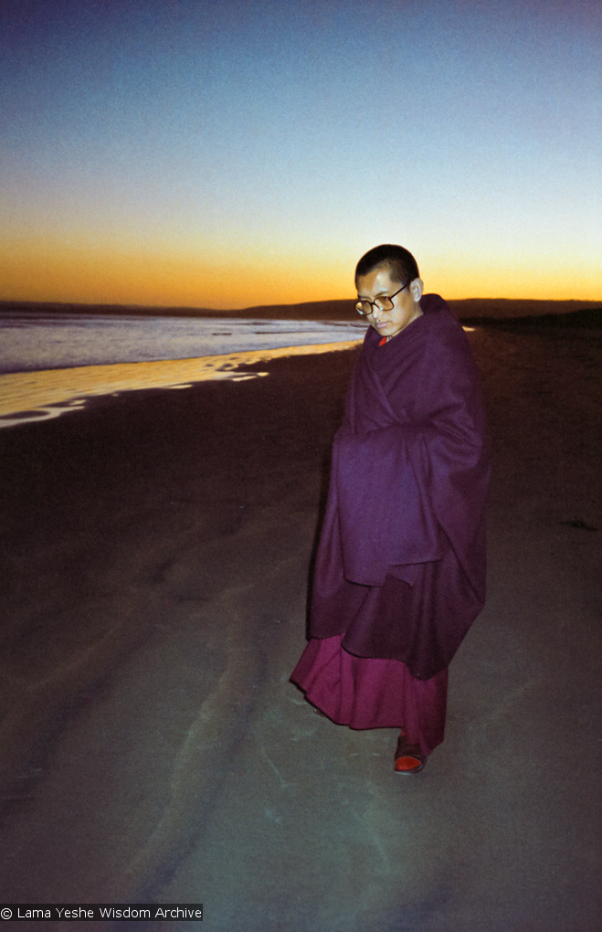 Lama Zopa Rinpoche at the beach, 1983