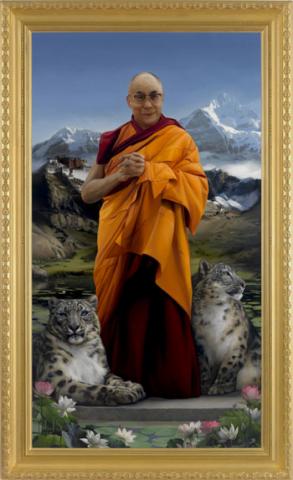 A framed portrait of His Holiness the Dalai Lama with two snow leopards, standing before the Himalayan mountains.