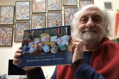 Nick Ribush with a copy of Rinpoche's Animal Friends, Lincoln, Massachusetts, USA, 2025.