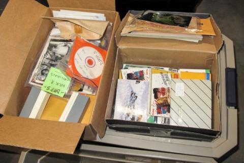 Boxes of of items donated for the Lama Yeshe Wisdom Archive image collection.
