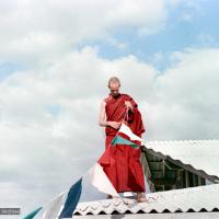 Jhampa attaching prayer-flags, CIN, 1976