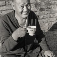 Lama having tea