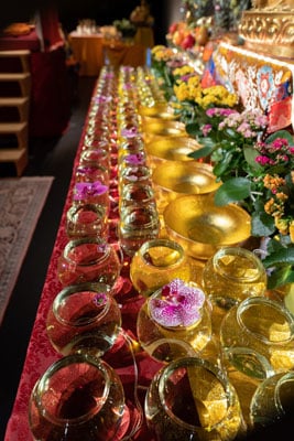 Water bowl offerings at Lama Zopa Rinpoche's teachings in Martigny, Switzerland, November 2018. Photo: Harald Weichhart.